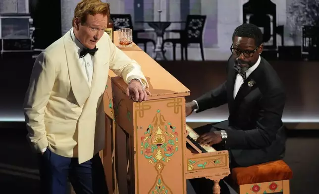 Host Conan O'Brien, left, and Sterling K. Brown perform during the Oscars on Sunday, March 15, 2026, at the Dolby Theatre in Los Angeles. (AP Photo/Chris Pizzello)