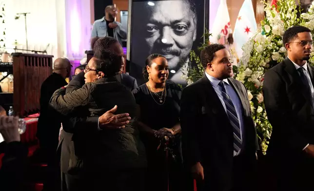 Rep. Jonathan Jackson, D-Ill., hugs a mourner at a public visitation for the Rev. Jesse Jackson at Rainbow PUSH Coalition headquarters Friday, Feb. 27, 2026, in Chicago. (AP Photo/Erin Hooley)