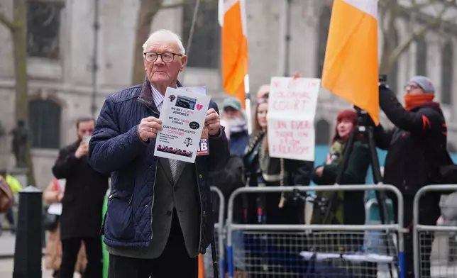 Claimant Barry Laycock poses for a photo outside the Royal Courts of Justice, where a civil claim is being brought against former Sinn Fein president Gerry Adams by three men who were injured in Provisional IRA bombings on the UK mainland in the 1970s and 1990s, in London, Monday March 9, 2026. (James Manning/PA via AP)