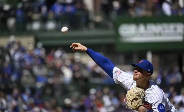 Chicago Cubs pitcher Cade Horton (22) delivers during the first inning of a baseball game against the Washington Nationals, Saturday, March 28, 2026, in Chicago. (AP Photo/Matt Marton)