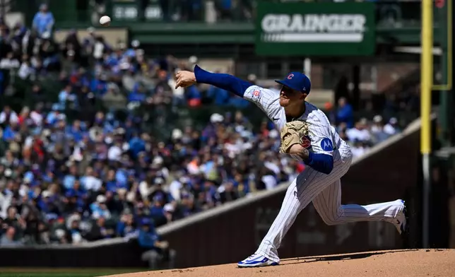 Chicago Cubs pitcher Cade Horton (22) delivers during the first inning of a baseball game against the Washington Nationals, Saturday, March 28, 2026, in Chicago. (AP Photo/Matt Marton)