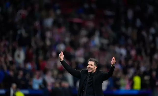 Atletico Madrid's head coach Diego Simeone celebrates after the Champions League play-off second leg soccer match between Atletico Madrid and Club Brugge, in Madrid, Spain, Tuesday, Feb. 24, 2026. (AP Photo/Manu Fernandez)