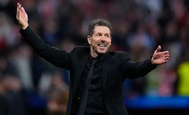 Atletico Madrid's head coach Diego Simeone celebrates after the Champions League play-off second leg soccer match between Atletico Madrid and Club Brugge, in Madrid, Spain, Tuesday, Feb. 24, 2026. (AP Photo/Manu Fernandez)