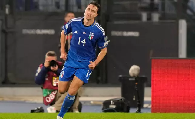 FILE - Italy's Federico Chiesa celebrates after scoring his sides second goal during an Euro 2024 group C qualifying soccer match between Italy and North Macedonia, at the Olympic Stadium stadium in Rome Friday, Nov. 17, 2023. (AP Photo/Andrew Medichini, File)