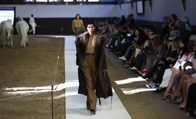 A model wears a creation from the Stella McCartney Fall/Winter 2026-2027 Women's collection presented in Paris, Wednesday, March 4, 2026. (AP Photo/Tom Nicholson)