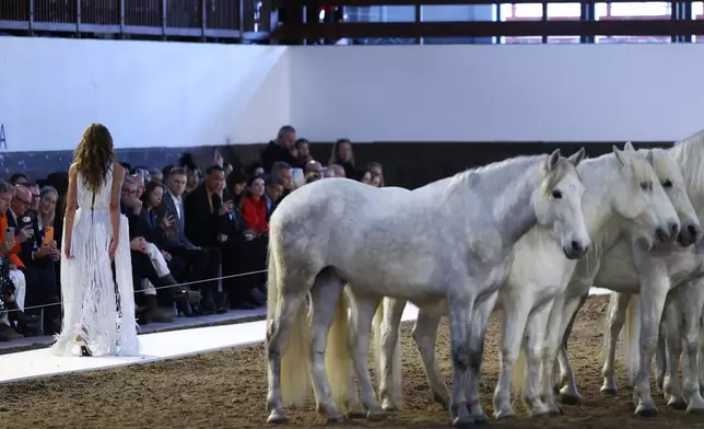 A model wears a creation from the Stella McCartney Fall/Winter 2026-2027 Women's collection presented in Paris, Wednesday, March 4, 2026. (AP Photo/Tom Nicholson)