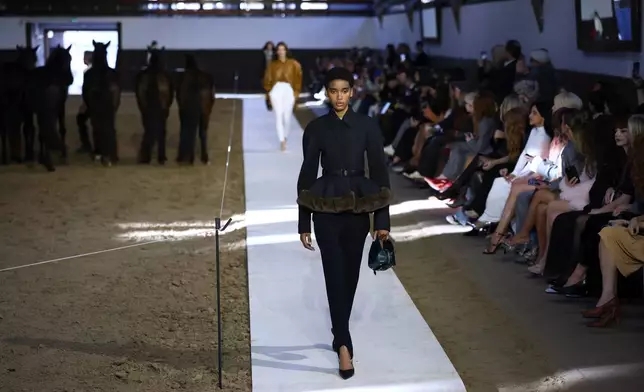 A model wears a creation from the Stella McCartney Fall/Winter 2026-2027 Women's collection presented in Paris, Wednesday, March 4, 2026. (AP Photo/Tom Nicholson)