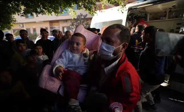 A group of toddlers return to Gaza more than two years after being evacuated as premature infants for medical treatment in Egypt, arriving at Nasser Hospital in Khan Younis, Gaza Strip, Monday, March 30, 2026. (AP Photo/Jehad Alshrafi)