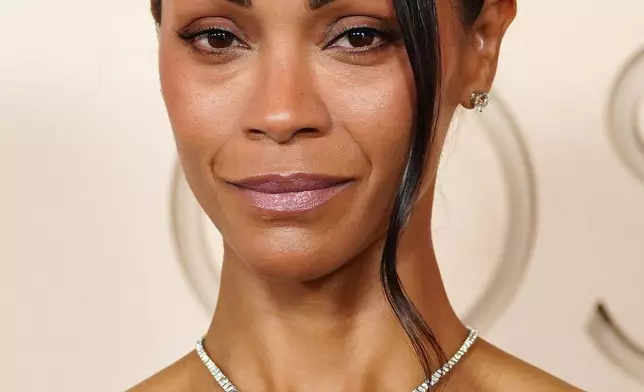 Zoe Saldana arrives at the Oscars on Sunday, March 15, 2026, at the Dolby Theatre in Los Angeles. (Photo by Jordan Strauss/Invision/AP)