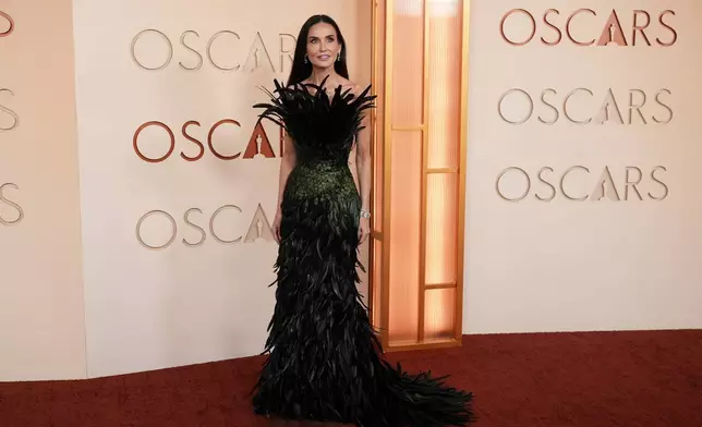 Demi Moore arrives at the Oscars on Sunday, March 15, 2026, at the Dolby Theatre in Los Angeles. (AP Photo/Gregory Bull)