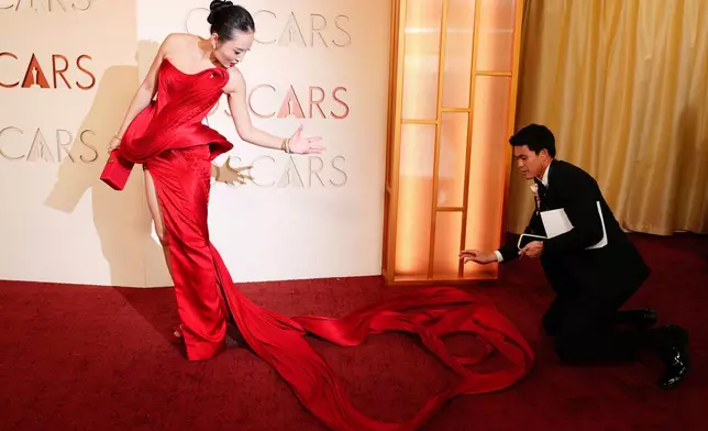 Li Jun Li arrives at the Oscars on Sunday, March 15, 2026, at the Dolby Theatre in Los Angeles. (Photo by Jordan Strauss/Invision/AP)
