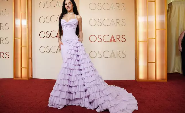 Chase Infiniti arrives at the Oscars on Sunday, March 15, 2026, at the Dolby Theatre in Los Angeles. (Photo by Jordan Strauss/Invision/AP)