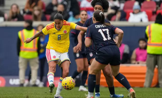 Colombia midfielder Marcela Restrepo (8) shoots during the first half of a SheBelieves Cup women's soccer match against the United States, Saturday, March 7, 2026, in Harrison, N.J. (AP Photo/Yuki Iwamura)