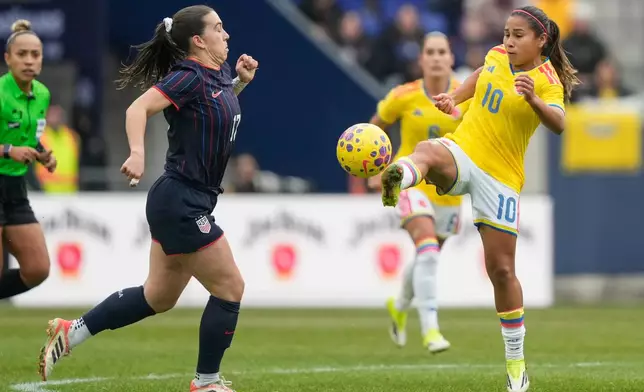 Colombia midfielder Leicy Santos (10) kicks the ball during the first half of a SheBelieves Cup women's soccer match against the United States, Saturday, March 7, 2026, in Harrison, N.J. (AP Photo/Yuki Iwamura)