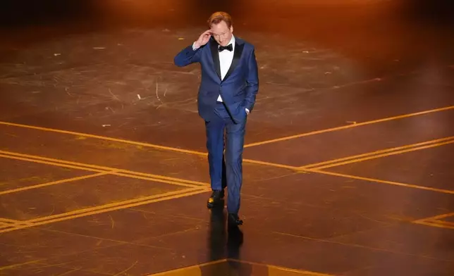 Host Conan O'Brien appears during the Oscars on Sunday, March 15, 2026, at the Dolby Theatre in Los Angeles. (AP Photo/Chris Pizzello)