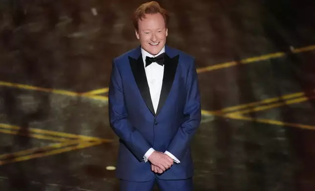 Host Conan O'Brien appears during the Oscars on Sunday, March 15, 2026, at the Dolby Theatre in Los Angeles. (AP Photo/Chris Pizzello)