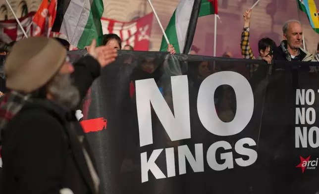 People take part in a national anti-war demonstration organized by "No Kings Italy movement" in Rome, Saturday, March 28, 2026. (AP Photo/Andrew Medichini)
