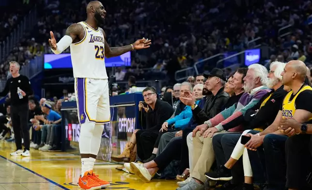 Los Angeles Lakers forward LeBron James (23) talks to fans during the first half of an NBA basketball game against the Golden State Warriors, Saturday, Feb. 28, 2026, in San Francisco. (AP Photo/Godofredo A. Vásquez)