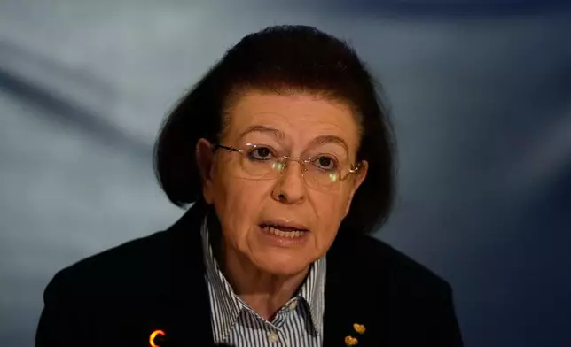 Greece's Culture Minister Lina Mendoni speaks during a press conference in Athens on Thursday, March 5, 2026, where material showing the final moments of Greek prisoners before their execution by Nazi forces at the Kaisariani firing range on May 1, 1944, was presented after the state acquired the wartime archive. (AP Photo/Thanassis Stavrakis)