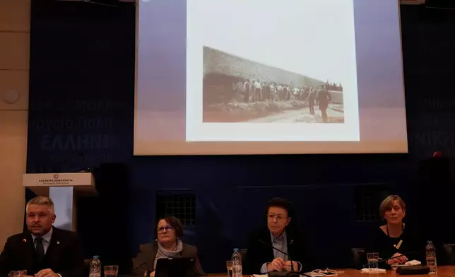 Photographs showing the final moments of Greek prisoners before their execution by Nazi forces at the Kaisariani firing range in Athens on May 1, 1944, are presented by Greece's Culture Minister Lina Mendoni, second right, after the state acquired the wartime archive, in Athens on Thursday, March 5, 2026. (AP Photo/Thanassis Stavrakis)