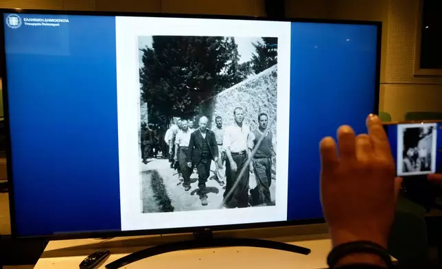 Photographs showing the final moments of Greek prisoners before their execution by Nazi forces at the Kaisariani firing range in Athens on May 1, 1944, are presented at Greece's Culture Ministry after the state acquired the wartime archive, in Athens on Thursday, March 5, 2026. (AP Photo/Thanassis Stavrakis)