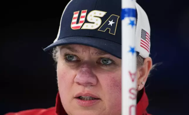 Laura Dwyer, of the United States competes against Estonia in a wheelchair curling mixed doubles round robin session at the 2026 Winter Paralympics, in Cortina d'Ampezzo, Italy, Thursday, March 5, 2026. (AP Photo/Emilio Morenatti)