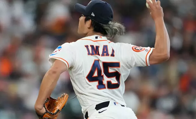 Houston Astros starting pitcher Tatsuya Imai throws during the second inning of a baseball game against the Los Angeles Angels in Houston, Sunday, March 29, 2026. (AP Photo/Ashley Landis)