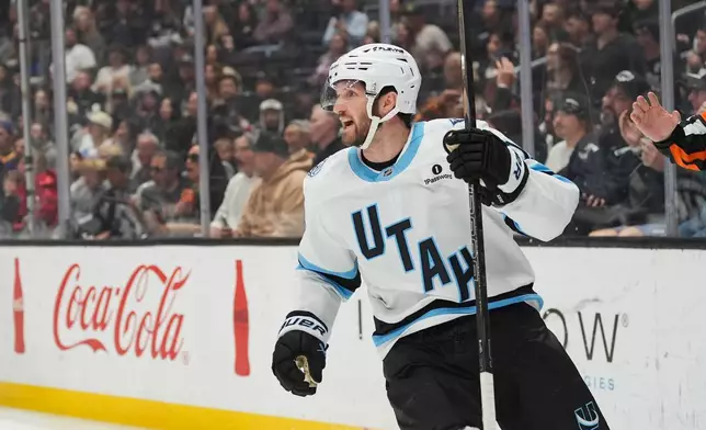 Utah Mammoth center Alexander Kerfoot (15) celebrates his goal during the first period of an NHL hockey game against the Los Angeles Kings Saturday, March 28, 2026, in Los Angeles. (AP Photo/Jae C. Hong)