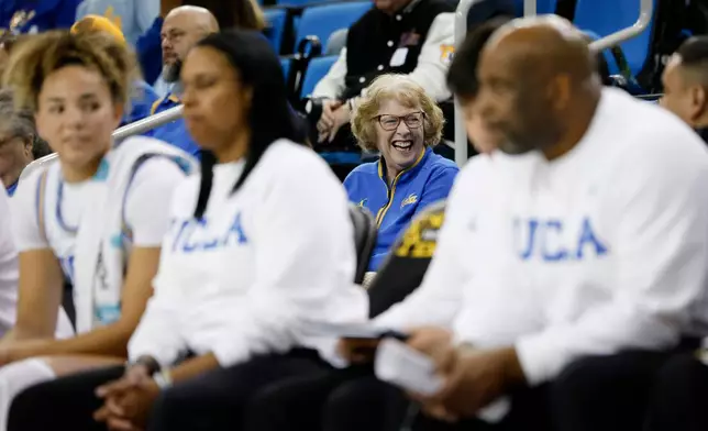 Patti Close, mother of UCLA head coach Cori Close, watches from the stands during the second half of an NCAA college basketball game against Rutgers, Wednesday, Feb. 4, 2026, in Los Angeles. (AP Photo/Caroline Brehman)