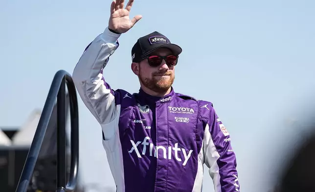Tyler Reddick is introduced to fans prior to a NASCAR Cup Series auto race, Sunday, March 22, 2026, in Darlington, S.C.(AP Photo/Matt Kelley)