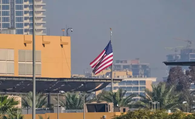 U.S. Embassy is seen across the Tigris River in Baghdad, Tuesday, March 17, 2026. (AP Photo/Hadi Mizban)