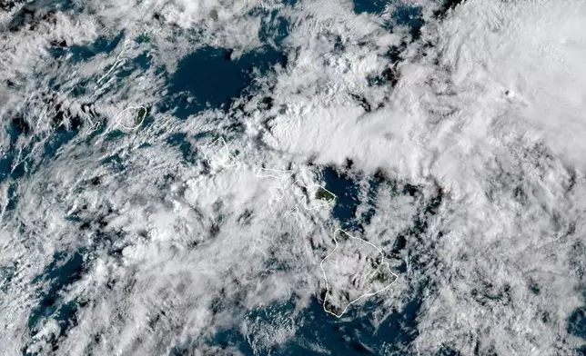 This satellite image provided by the U.S. National Oceanic and Atmospheric Administration shows cloud cover over Hawaii on Friday, March 20, 2026 at 2 p.m. EDT. (NOAA via AP)