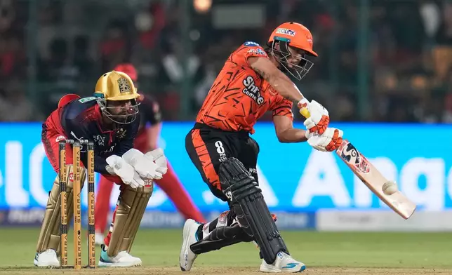 Sunrisers Hyderabad's captain Ishan Kishan plays a shot during the Indian Premier League cricket match between Royal Challengers Bengaluru and Sunrisers Hyderabad in Bengaluru, India, Saturday, March 28, 2026. (AP Photo/Aijaz Rahi)