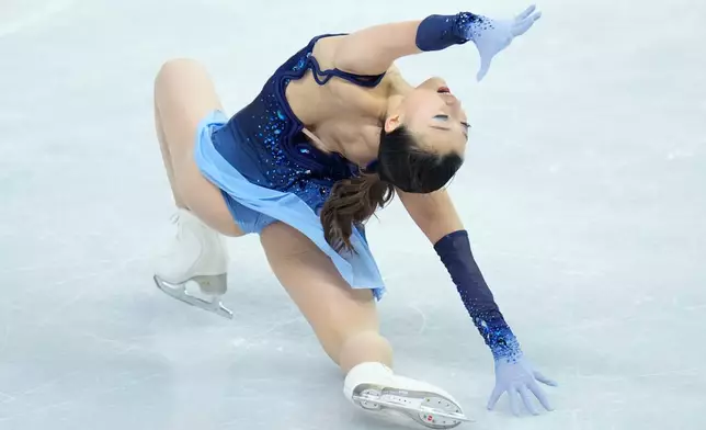 Kaori Sakamoto from Japan skates during the women¥s short program at the Figure Skating World Championships in Prague, Czech Republic, Wednesday, March 25, 2026. (AP Photo/Petr David Josek)
