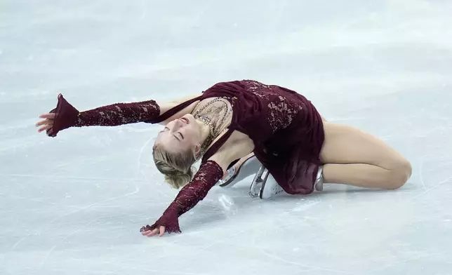 Amber Glenn from the United States skates during the women¥s short program at the Figure Skating World Championships in Prague, Czech Republic, Wednesday, March 25, 2026. (AP Photo/Petr David Josek)