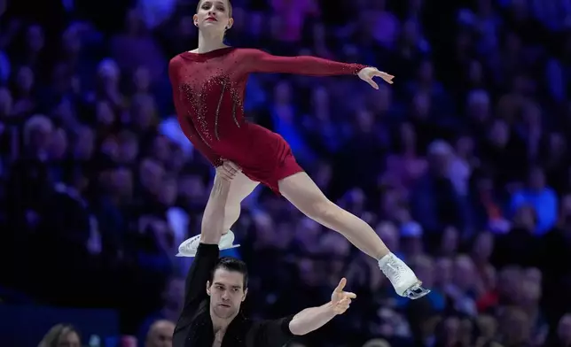 Minerva Fabienne Hase and Nikita Volodin from Germany perform during the pairs short program at the Figure Skating World Championships in Prague, Czech Republic, Wednesday, March 25, 2026. (AP Photo/Petr David Josek)