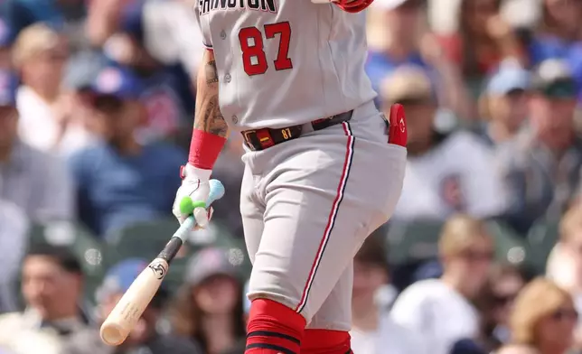 Washington Nationals Andrés Chaparro (87) reacts after striking out during the third inning of a baseball game against the Chicago Cubs at Wrigley Field on Sunday, March 29, 2026, in Chicago. (AP Photo/Geoff Stellfox)