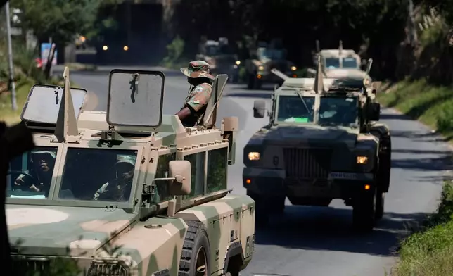 South African National Defense Forces deploy in the Riverlea township of Johannesburg, South Africa, Wednesday, March 11, 2026. (AP Photo/Themba Hadebe)