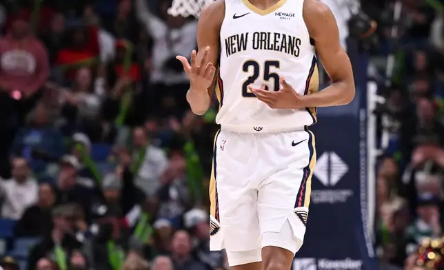 New Orleans Pelicans forward Trey Murphy III celebrates after a play during the first half of an NBA basketball game against the Dallas Mavericks in New Orleans, Monday, March 16, 2026. (AP Photo/Ella Hall)