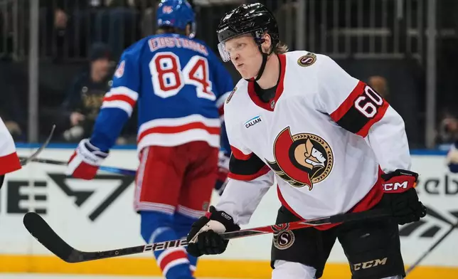 Ottawa Senators' Lassi Thomson (60) reacts after getting hurt during the second period of an NHL hockey game against the New York Rangers Monday, March 23, 2026, in New York. (AP Photo/Frank Franklin II)