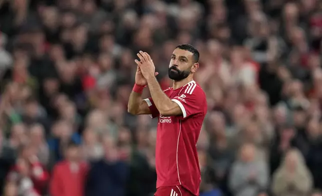Liverpool's Mohamed Salah leaves the field after substitution during the second leg of the Champions League round of 16 soccer match between Liverpool and Galatasaray, in Liverpool, England, Wednesday, March 18, 2026. (AP Photo/Jon Super)