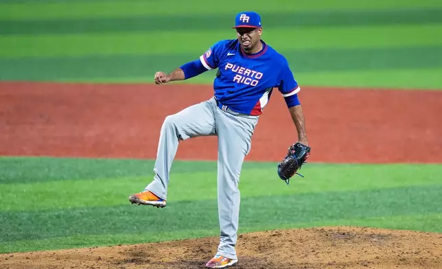 Puerto Rico pitcher Edwin Diaz reacts at the end of the ninth inning of a World Baseball Classic game against Colombia in San Juan, Puerto Rico, Friday, March 6, 2026. (AP Photo/Fernando Llano)