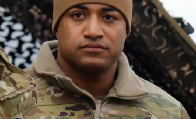 This photo provided by the U.S. Army shows Maj. Brandon Shah, Friday, Jan. 14, 2020, in Illesheim, Germany. (Pfc. Savannah Roy/U.S. Army/DVIDS via AP)