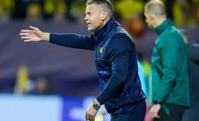 Bodo/Glimt's coach Kjetil Knutsen gives instructions during the Champions League soccer match between Bodo/Glimt and Sporting Lisbon, in Bodo, Norway, Wednesday March 11, 2026. (Fredrik Varfjell/NTB Scanpix via AP)