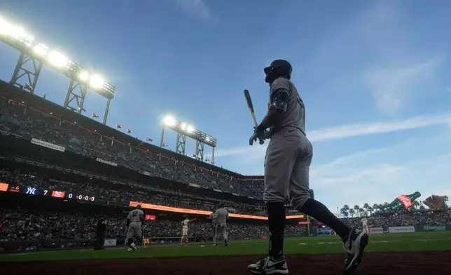 New York Yankees' Aaron Judge walks to the on deck circle during the sixth inning of a baseball game against the San Francisco Giants in San Francisco, Wednesday, March 25, 2026. (AP Photo/Jeff Chiu)