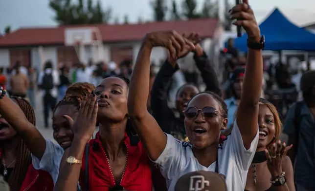 Fans cheer as rapper Clem Cleopatre performs in Goma, Democratic Republic of Congo, Saturday, March 28, 2026. (AP Photo/Moses Sawasawa)