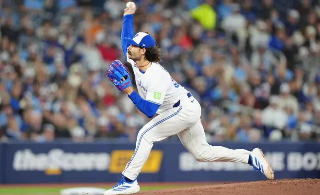 Toronto Blue Jays pitcher Dylan Cease (84) throws during the first inning of a baseball game against the Athletics in Toronto Saturday, March 28, 2026. (Frank Gunn/The Canadian Press via AP)