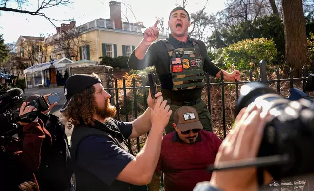 Jake Lang demonstrates outside Gracie Mansion after a news conference by New York Mayor Zohran Mamdani , Monday, March 9, 2026, in New York. (AP Photo/Angelina Katsanis)