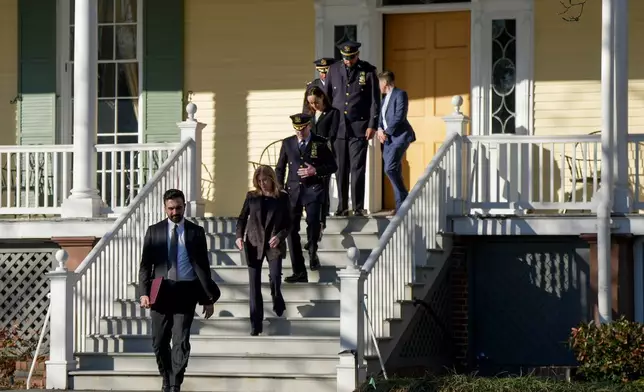 New York Mayor Zohran Mamdani, left, walks out of Gracie Mansion with New York Police commissioner Jessica Tisch, second from left, to make an address at a news conference, Monday, March 9, 2026, in New York. (AP Photo/Angelina Katsanis)