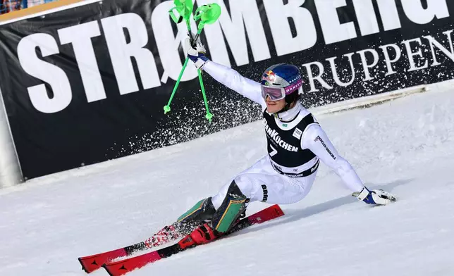Brazil's Lucas Pinheiro Braathen arrives at the finish area after straddling a pole during an alpine ski, men's slalom race, at the Lillehammer World Cup Finals, in Hafjell, Norway, Wednesday, March 25, 2026. (AP Photo/Marco Trovati)
